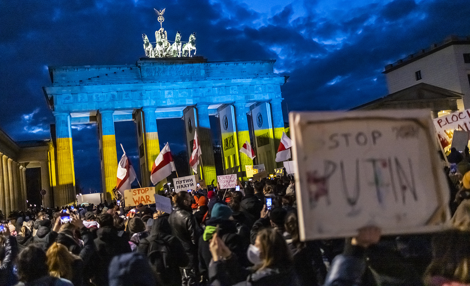 People protest in front of the Brandenburg Gate, Berlin, on February 24 against the Russian invasion of Ukraine. 