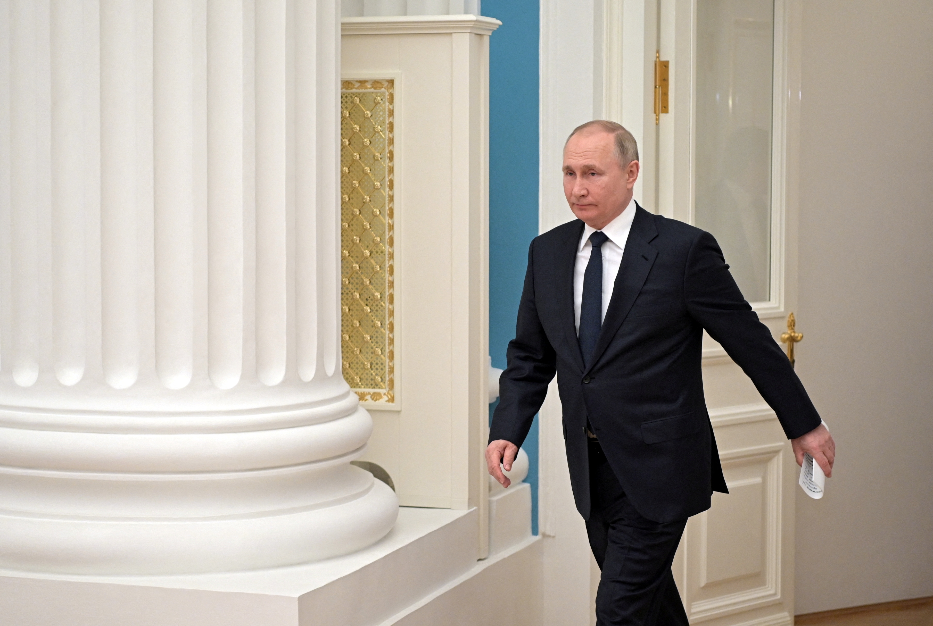 Russian President Vladimir Putin arrives for a meeting with representatives of the business community at the Kremlin in Moscow, Russia February 24, 2022. Sputnik/Aleksey Nikolskyi/Kremlin via REUTERS