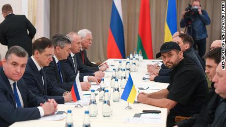 Delegates from Russia and Ukraine take part in talks on Monday. 