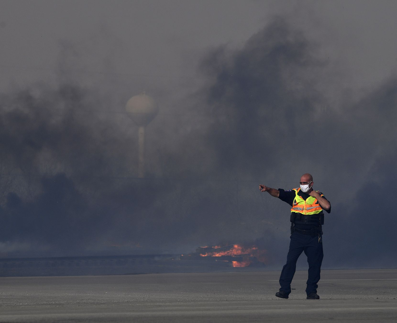 A member of the Abilene Fire Department directed motorists to turn around after the fire...