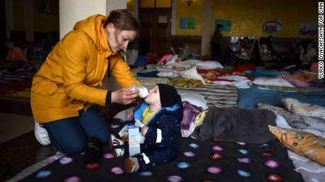 Nadiia Taratorina, 22, and her 6-month-old son Artem fled to the relative safety of the Carpathian Mountains, in early March. Weeks later, she decided to return home to Kryvyi Rih despite ongoing fighting there.