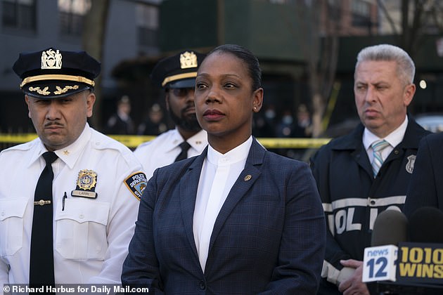 New York City Police Commissioner Keechant Sewell (middle) held a press conference outside the scene on Friday