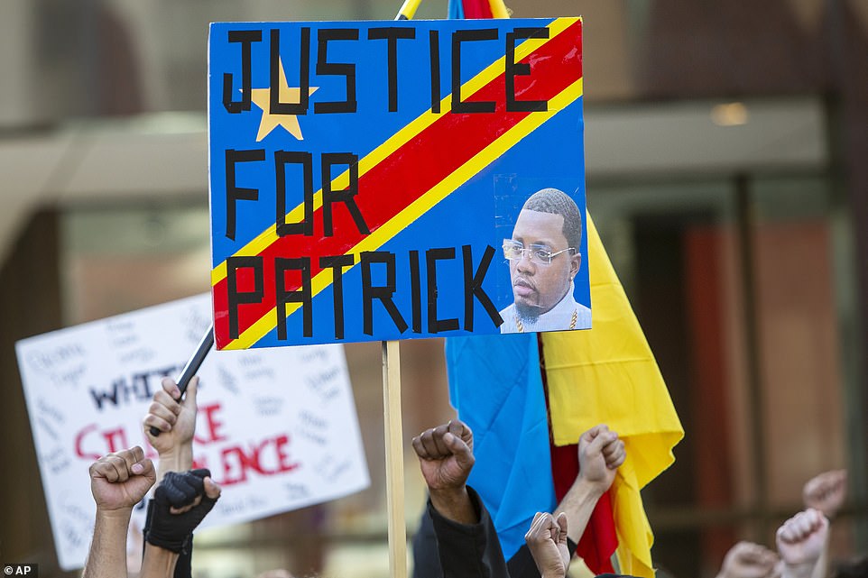 Activists rally for Patrick Lyoya in Grand Rapids, Michigan on Tuesday, April 12, after he was shot by a police officer