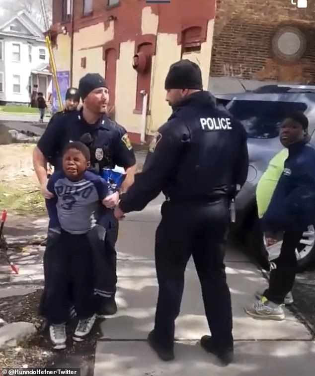 Syracuse Police were seen putting a young black boy in the a police car after allegedly stealing a bag of chips