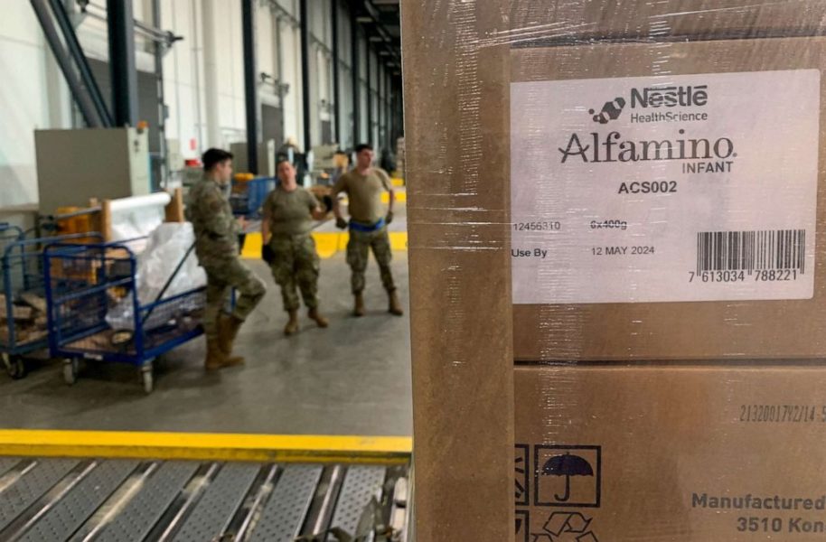 PHOTO: Soldiers load up boxes of baby formula ready for first shipments to U.S from Europe at Ramstein U.S. ARMY base, Germany, May 21, 2022.